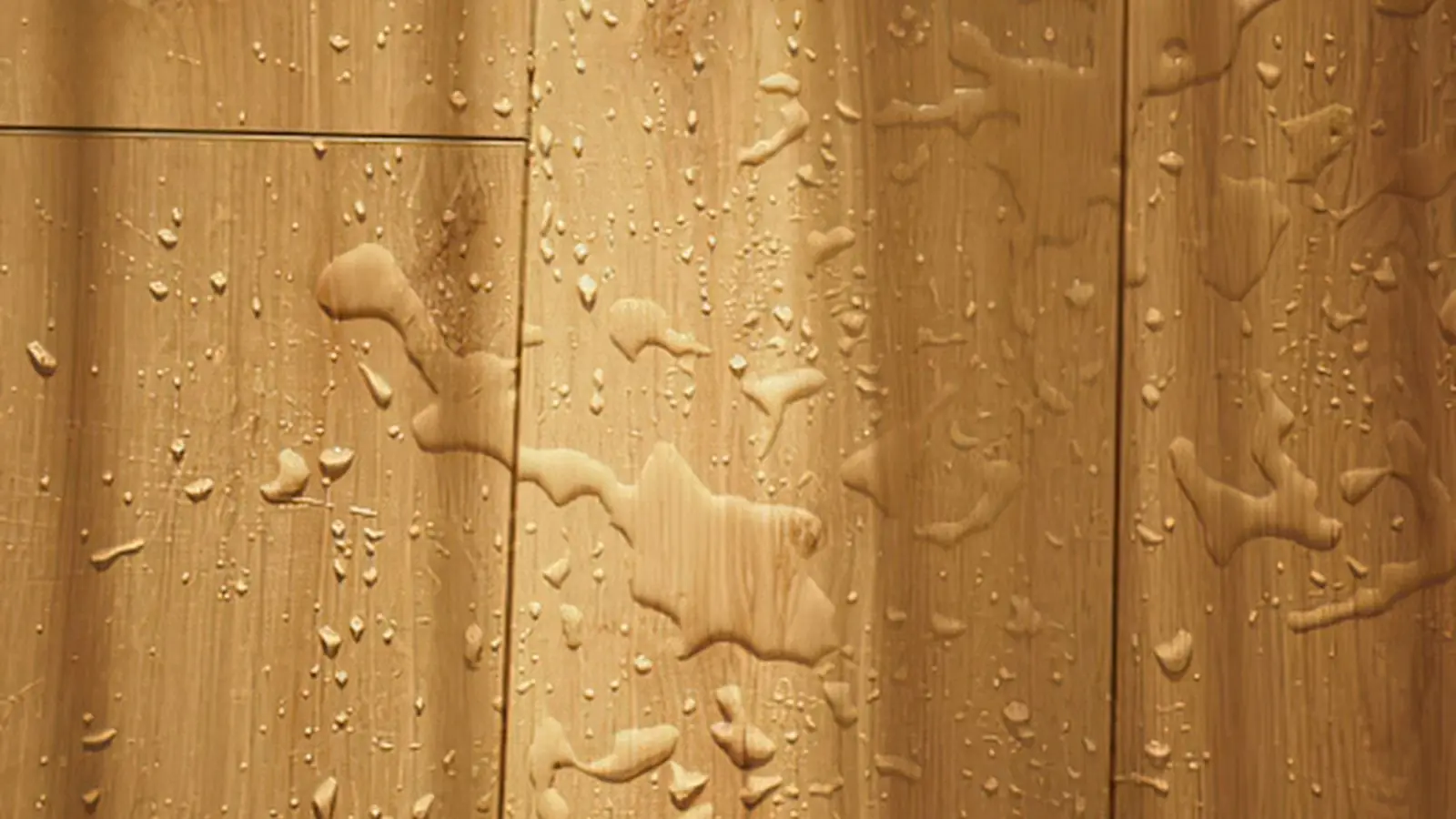 Water droplets on a wood plank floor